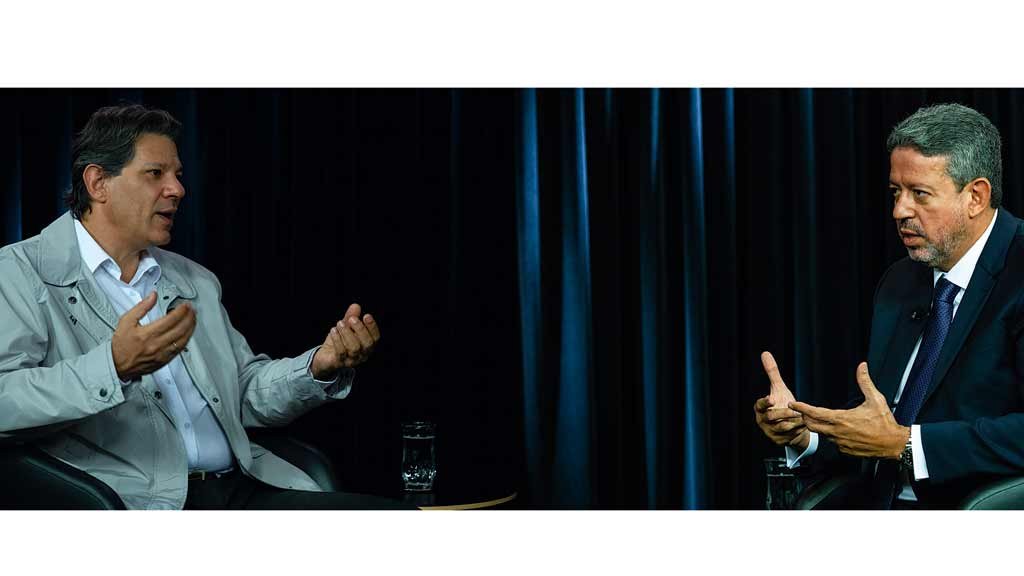 O ministro da Fazenda, Fernando Haddad, e o presidente da Câmara, Arthur Lira: debate sobre divisão de cargos, baseada na estratégia de "governabilidade" de Lula (Crédito: Eliseu Paesph)